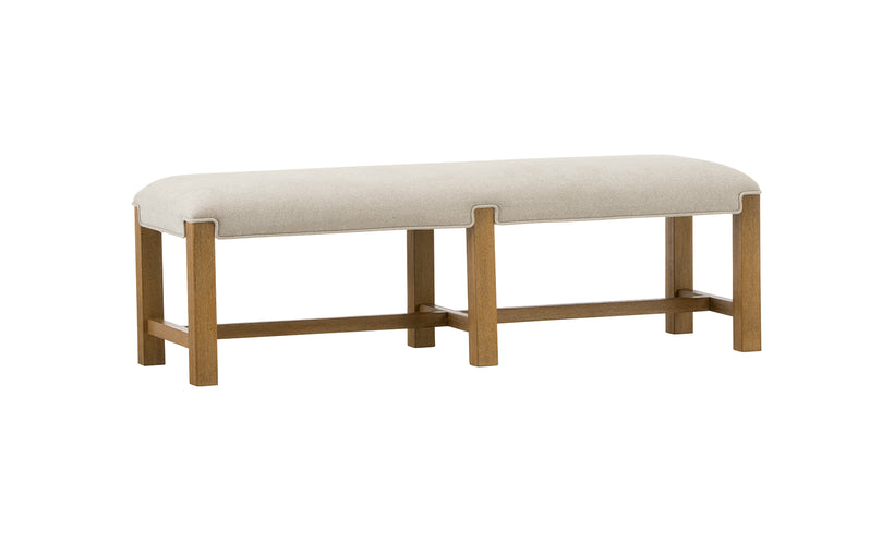 Bench with beige cushion and wooden frame on a white background